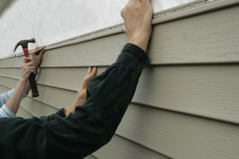 Attaching Vinyl Siding Panels